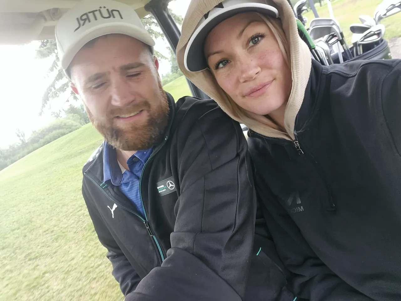 Lacey and family golfing on a cool day